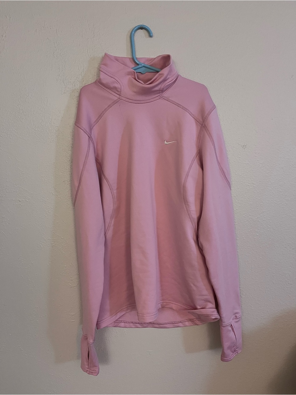 Pink Nike Pro Dri-FIT long-sleeve athletic training top